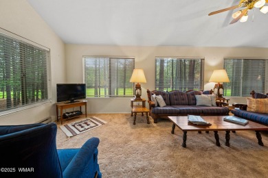 Set on a beautiful 0.52-acre lot surrounded by towering pines on Pinetop Lakes Country Club in Arizona - for sale on GolfHomes.com, golf home, golf lot