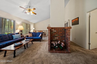 Set on a beautiful 0.52-acre lot surrounded by towering pines on Pinetop Lakes Country Club in Arizona - for sale on GolfHomes.com, golf home, golf lot