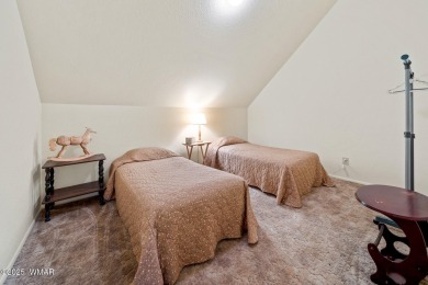 Set on a beautiful 0.52-acre lot surrounded by towering pines on Pinetop Lakes Country Club in Arizona - for sale on GolfHomes.com, golf home, golf lot
