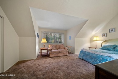 Set on a beautiful 0.52-acre lot surrounded by towering pines on Pinetop Lakes Country Club in Arizona - for sale on GolfHomes.com, golf home, golf lot