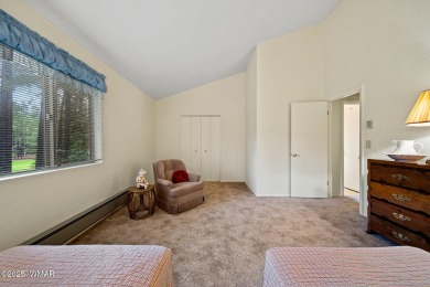 Set on a beautiful 0.52-acre lot surrounded by towering pines on Pinetop Lakes Country Club in Arizona - for sale on GolfHomes.com, golf home, golf lot