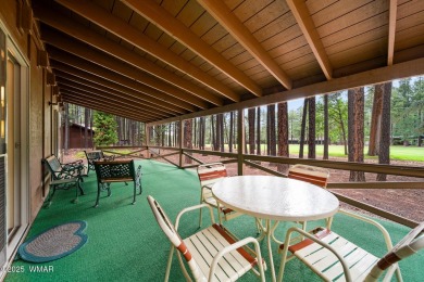 Set on a beautiful 0.52-acre lot surrounded by towering pines on Pinetop Lakes Country Club in Arizona - for sale on GolfHomes.com, golf home, golf lot