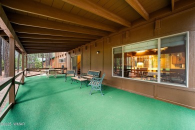 Set on a beautiful 0.52-acre lot surrounded by towering pines on Pinetop Lakes Country Club in Arizona - for sale on GolfHomes.com, golf home, golf lot