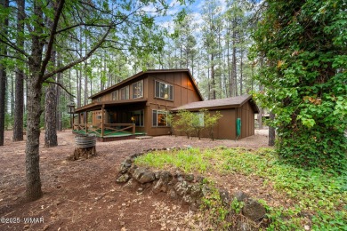 Set on a beautiful 0.52-acre lot surrounded by towering pines on Pinetop Lakes Country Club in Arizona - for sale on GolfHomes.com, golf home, golf lot