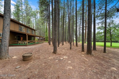 Set on a beautiful 0.52-acre lot surrounded by towering pines on Pinetop Lakes Country Club in Arizona - for sale on GolfHomes.com, golf home, golf lot