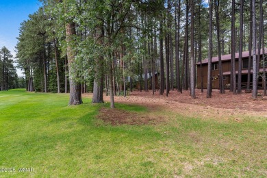 Set on a beautiful 0.52-acre lot surrounded by towering pines on Pinetop Lakes Country Club in Arizona - for sale on GolfHomes.com, golf home, golf lot