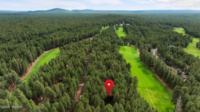 Set on a beautiful 0.52-acre lot surrounded by towering pines on Pinetop Lakes Country Club in Arizona - for sale on GolfHomes.com, golf home, golf lot