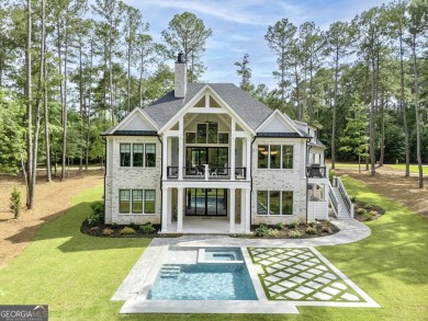 This meticulous custom golf residence is impeccably built with on Reynolds Lake Oconee - The Oconee in Georgia - for sale on GolfHomes.com, golf home, golf lot