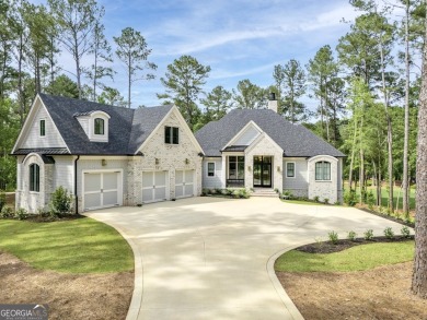 This meticulous custom golf residence is impeccably built with on Reynolds Lake Oconee - The Oconee in Georgia - for sale on GolfHomes.com, golf home, golf lot