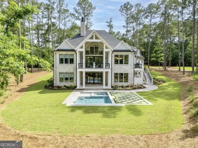 This meticulous custom golf residence is impeccably built with on Reynolds Lake Oconee - The Oconee in Georgia - for sale on GolfHomes.com, golf home, golf lot