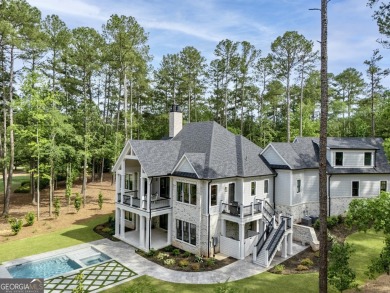 This meticulous custom golf residence is impeccably built with on Reynolds Lake Oconee - The Oconee in Georgia - for sale on GolfHomes.com, golf home, golf lot