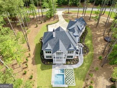 This meticulous custom golf residence is impeccably built with on Reynolds Lake Oconee - The Oconee in Georgia - for sale on GolfHomes.com, golf home, golf lot