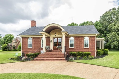 This HOME is an Entertainer's DREAM. Very Open floorplan with on Covington Country Club in Tennessee - for sale on GolfHomes.com, golf home, golf lot
