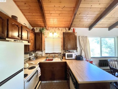 This cabin in the pines called 'Lil Oak Hill' is beautifully on Pine Mountain Lake Country Club in California - for sale on GolfHomes.com, golf home, golf lot