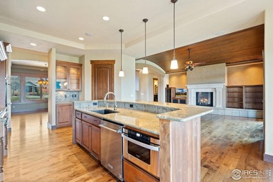 Exquisite Custom Home with Mountain and Golf Course on Harmony Golf Club in Colorado - for sale on GolfHomes.com, golf home, golf lot