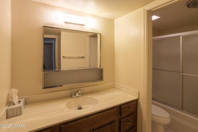 Welcome to this charming lower-level condo in the desirable on Pinetop Lakes Golf and Country Club in Arizona - for sale on GolfHomes.com, golf home, golf lot