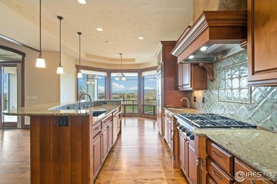 Exquisite Custom Home with Mountain and Golf Course on Harmony Golf Club in Colorado - for sale on GolfHomes.com, golf home, golf lot