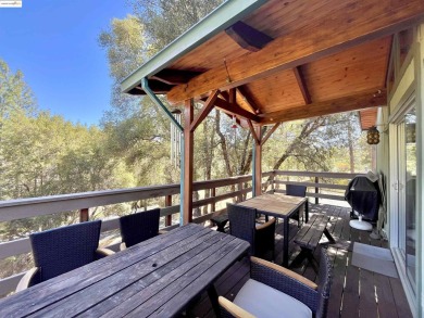 This cabin in the pines called 'Lil Oak Hill' is beautifully on Pine Mountain Lake Country Club in California - for sale on GolfHomes.com, golf home, golf lot