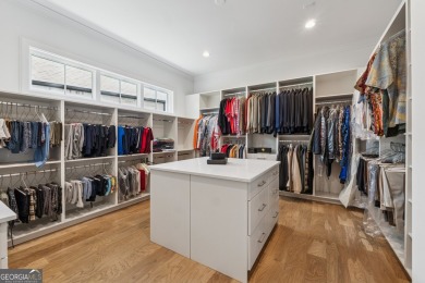 Experience timeless luxury at 4020 Cottage Park Ct, nestled on Manor Golf and Country Club in Georgia - for sale on GolfHomes.com, golf home, golf lot
