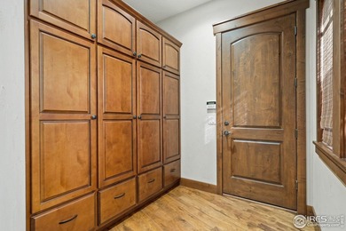 Exquisite Custom Home with Mountain and Golf Course on Harmony Golf Club in Colorado - for sale on GolfHomes.com, golf home, golf lot