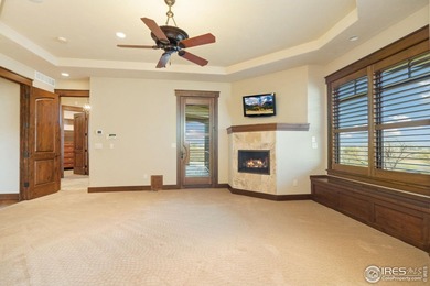 Exquisite Custom Home with Mountain and Golf Course on Harmony Golf Club in Colorado - for sale on GolfHomes.com, golf home, golf lot