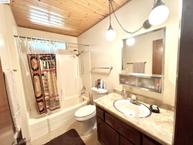 This cabin in the pines called 'Lil Oak Hill' is beautifully on Pine Mountain Lake Country Club in California - for sale on GolfHomes.com, golf home, golf lot