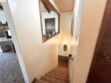 This cabin in the pines called 'Lil Oak Hill' is beautifully on Pine Mountain Lake Country Club in California - for sale on GolfHomes.com, golf home, golf lot