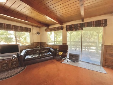 This cabin in the pines called 'Lil Oak Hill' is beautifully on Pine Mountain Lake Country Club in California - for sale on GolfHomes.com, golf home, golf lot