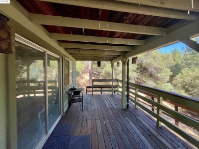 This cabin in the pines called 'Lil Oak Hill' is beautifully on Pine Mountain Lake Country Club in California - for sale on GolfHomes.com, golf home, golf lot