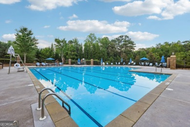 Experience timeless luxury at 4020 Cottage Park Ct, nestled on Manor Golf and Country Club in Georgia - for sale on GolfHomes.com, golf home, golf lot