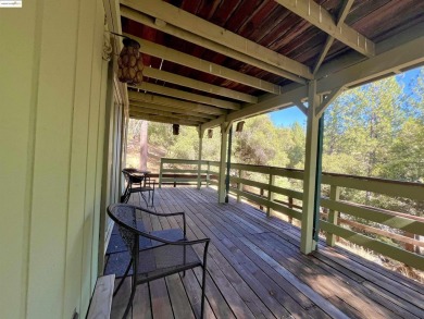 This cabin in the pines called 'Lil Oak Hill' is beautifully on Pine Mountain Lake Country Club in California - for sale on GolfHomes.com, golf home, golf lot