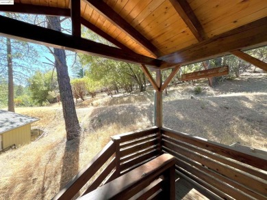 This cabin in the pines called 'Lil Oak Hill' is beautifully on Pine Mountain Lake Country Club in California - for sale on GolfHomes.com, golf home, golf lot