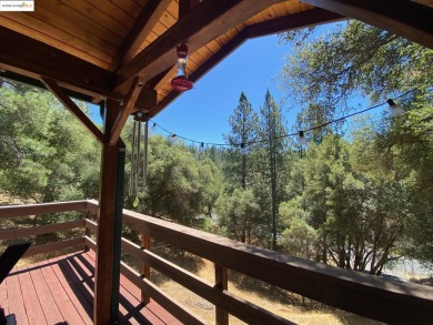 This cabin in the pines called 'Lil Oak Hill' is beautifully on Pine Mountain Lake Country Club in California - for sale on GolfHomes.com, golf home, golf lot