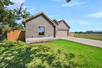 Welcome to 518 Dolphin Terrace in beautiful Runaway Bay, Texas!
 on The Club At Runaway Bay in Texas - for sale on GolfHomes.com, golf home, golf lot