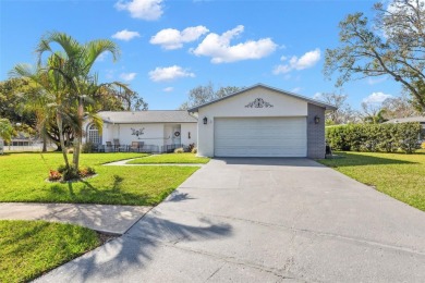 Welcome home to the sought-after neighborhood of Highland Lakes on Highland Lakes Executive Golf Course in Florida - for sale on GolfHomes.com, golf home, golf lot