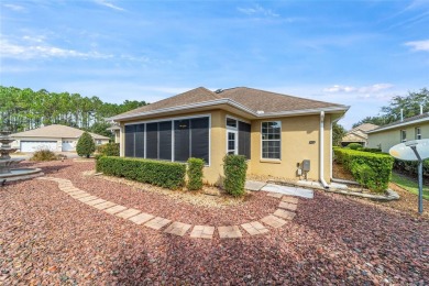 Gorgeous 3/2/2 w/ low maintenance landscaping on over 1/4 acre on On Top of the World Golf Course in Florida - for sale on GolfHomes.com, golf home, golf lot