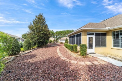 Gorgeous 3/2/2 w/ low maintenance landscaping on over 1/4 acre on On Top of the World Golf Course in Florida - for sale on GolfHomes.com, golf home, golf lot