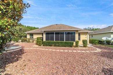 Gorgeous 3/2/2 w/ low maintenance landscaping on over 1/4 acre on On Top of the World Golf Course in Florida - for sale on GolfHomes.com, golf home, golf lot