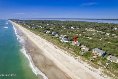 This classic, oceanfront four-bedroom home with an elevator is on The Country Club of the Crystal Coast in North Carolina - for sale on GolfHomes.com, golf home, golf lot