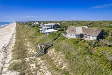 This classic, oceanfront four-bedroom home with an elevator is on The Country Club of the Crystal Coast in North Carolina - for sale on GolfHomes.com, golf home, golf lot