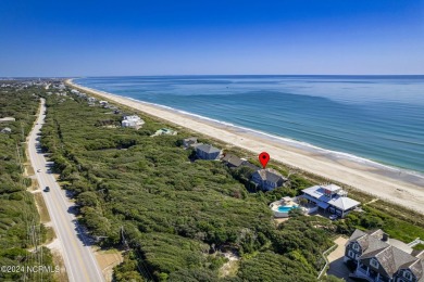 This classic, oceanfront four-bedroom home with an elevator is on The Country Club of the Crystal Coast in North Carolina - for sale on GolfHomes.com, golf home, golf lot