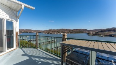 Enjoy breathtaking views of the lake from this stunning on The Club At Old Kinderhook in Missouri - for sale on GolfHomes.com, golf home, golf lot