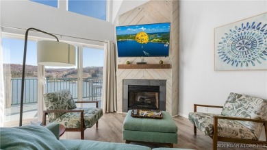 Enjoy breathtaking views of the lake from this stunning on The Club At Old Kinderhook in Missouri - for sale on GolfHomes.com, golf home, golf lot