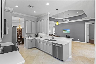 Beautiful 3-bedroom, 3-bath pool home in the highly desired PGA on The Legacy Golf and Tennis Club in Florida - for sale on GolfHomes.com, golf home, golf lot