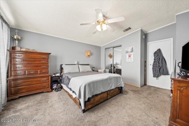 Charming 2-Bedroom Home with Golf Course Views! This on Barefoot Bay Golf Course in Florida - for sale on GolfHomes.com, golf home, golf lot
