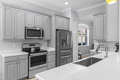 Beautiful 3-bedroom, 3-bath pool home in the highly desired PGA on The Legacy Golf and Tennis Club in Florida - for sale on GolfHomes.com, golf home, golf lot