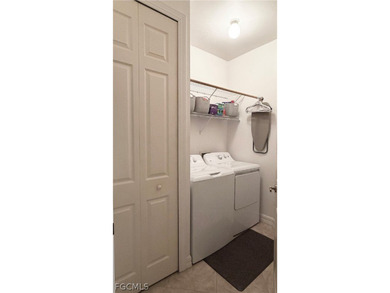 Exceptional Coach Home with Golf Course Views in Gateway Hidden on Gateway Golf and Country Club in Florida - for sale on GolfHomes.com, golf home, golf lot