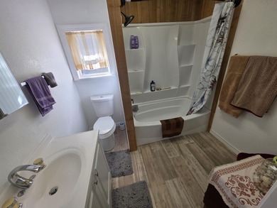 Super-cute, Cypress & Stone home with 3 bedrooms, 2 baths and on The Course At Turkey Mountain in Arkansas - for sale on GolfHomes.com, golf home, golf lot