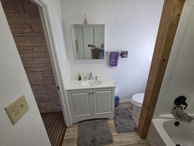 Super-cute, Cypress & Stone home with 3 bedrooms, 2 baths and on The Course At Turkey Mountain in Arkansas - for sale on GolfHomes.com, golf home, golf lot