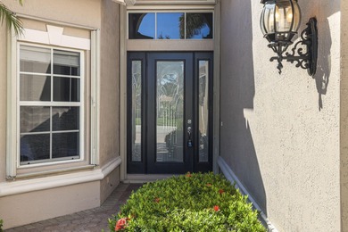 Beautiful 3-bedroom, 3-bath pool home in the highly desired PGA on The Legacy Golf and Tennis Club in Florida - for sale on GolfHomes.com, golf home, golf lot